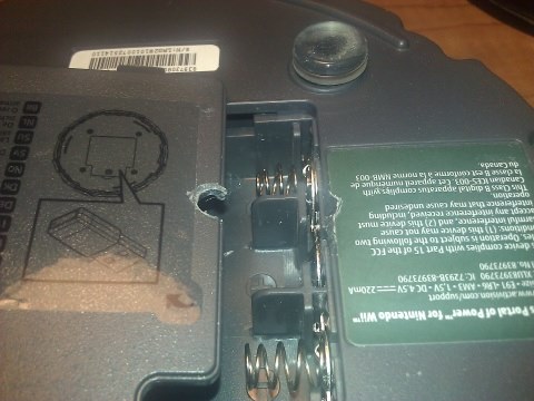 Small hole drilled in the battery cover